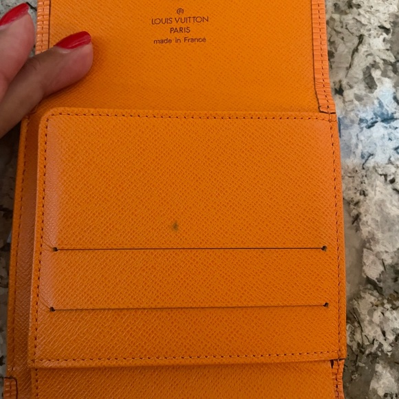 Authentic Louis Vuitton Orange Epi Compact Wallet. - Picture 4 of 6